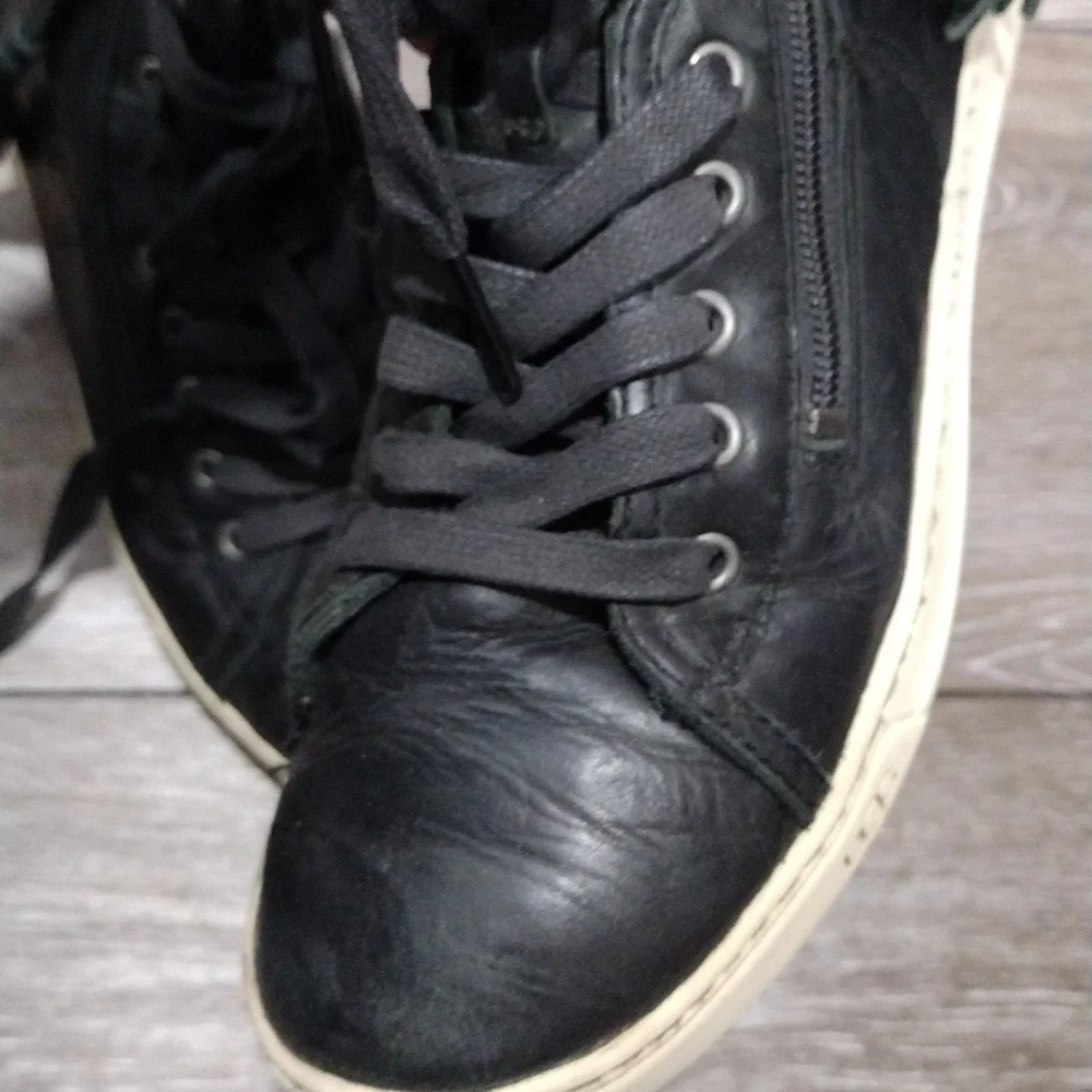 UGG womens black leather zip or lace high top sneakers. Size 8